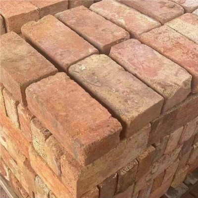 Yellow reclaimed refractory bricks